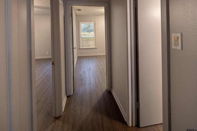 hall featuring dark hardwood / wood-style floors