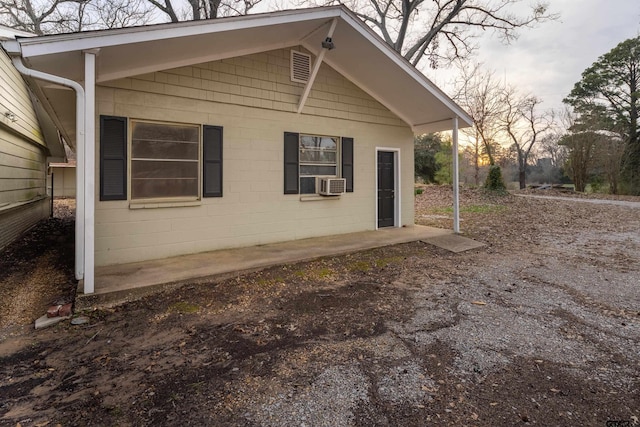 view of home's exterior with cooling unit