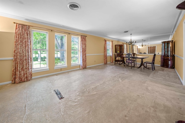 1101 Canada St, Jacksonville, TX 75766 - dining room with a chandelier, crown molding, and baseboards