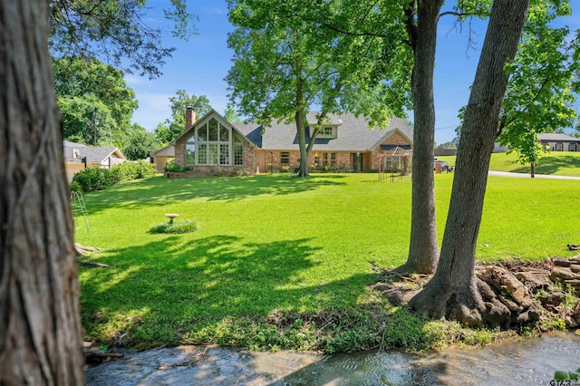 1101 Canada St, Jacksonville, TX 75766 - view of green lawn featuring a water view