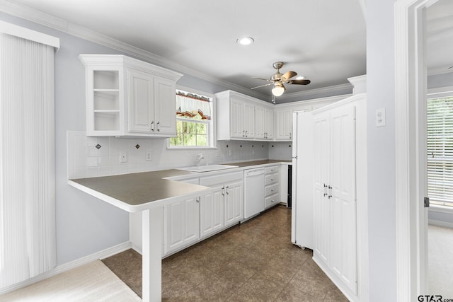 801 Wilder Way, Tyler, TX 75703 - kitchen with dishwasher, white cabinetry, ornamental molding, ceiling fan, and tasteful backsplash