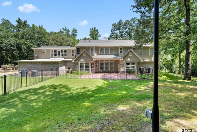 801 Wilder Way, Tyler, TX 75703 - back of property featuring french doors, a patio area, a fenced backyard, and brick siding