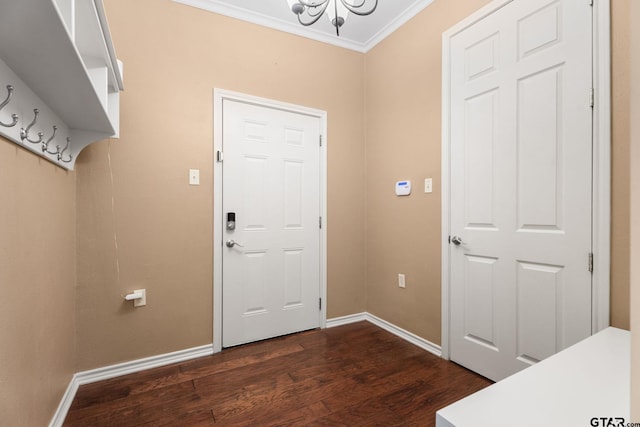 801 Wilder Way, Tyler, TX 75703 - entryway with ornamental molding, dark wood-type flooring, and a chandelier