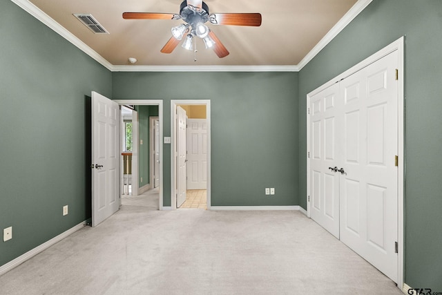 801 Wilder Way, Tyler, TX 75703 - unfurnished bedroom featuring crown molding, carpet, a ceiling fan, and a closet
