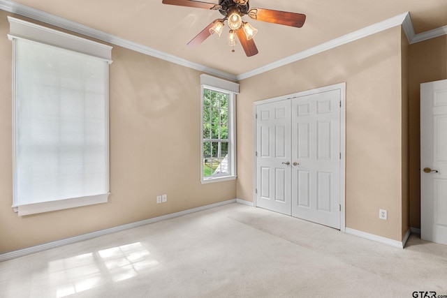 801 Wilder Way, Tyler, TX 75703 - unfurnished bedroom featuring carpet flooring, crown molding, a closet, and ceiling fan