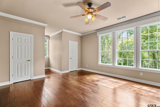 801 Wilder Way, Tyler, TX 75703 - spare room with wood-type flooring, ceiling fan, and ornamental molding