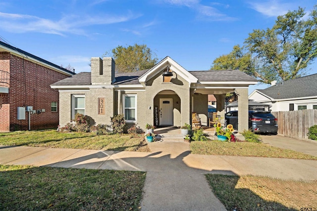 view of front of property featuring a front yard