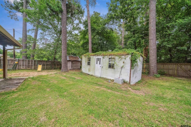 10236 County Road 2253, Tyler, TX 75707 - fenced backyard featuring a shed