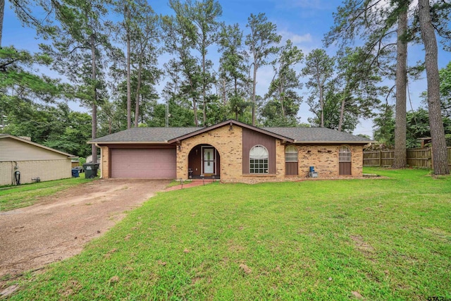 10236 County Road 2253, Tyler, TX 75707 - view of front facade featuring driveway, brick siding, an attached garage, and roof with shingles