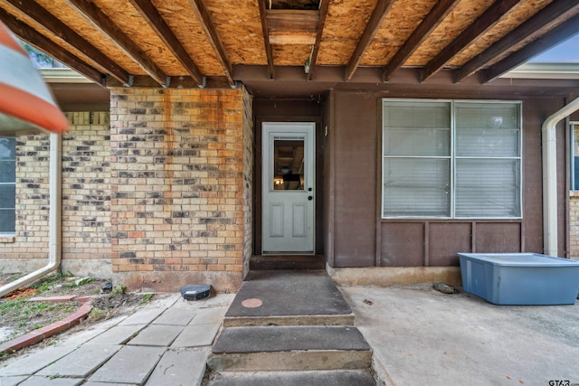 10236 County Road 2253, Tyler, TX 75707 - doorway to property featuring brick siding