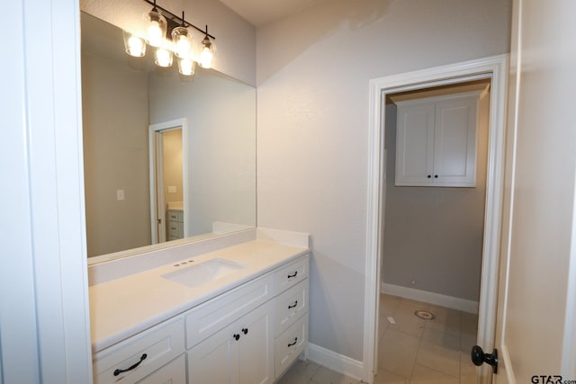 bathroom with vanity and tile patterned floors