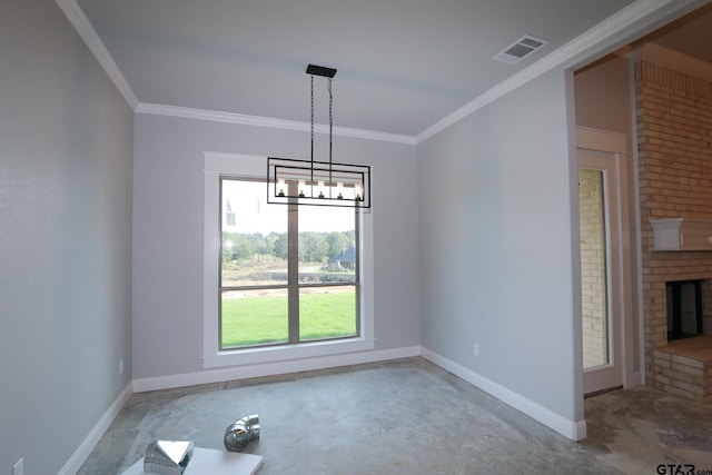 unfurnished dining area with a brick fireplace and crown molding