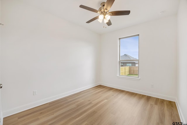 empty room featuring light hardwood / wood-style floors and ceiling fan