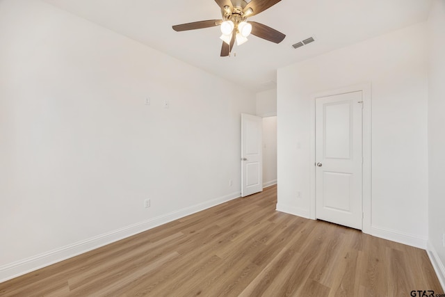 unfurnished bedroom featuring ceiling fan and light hardwood / wood-style flooring