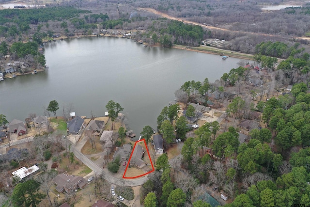 drone / aerial view with a water view