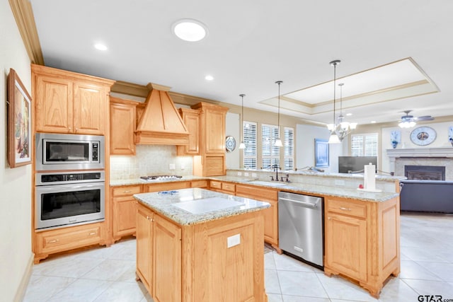 kitchen with premium range hood, stainless steel appliances, and light brown cabinets