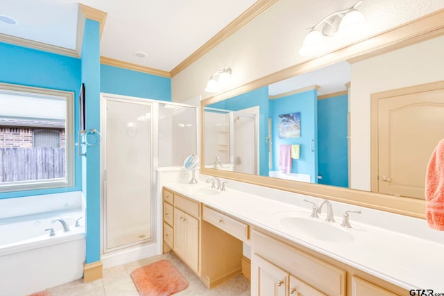 bathroom with tile patterned flooring, a shower stall, crown molding, double vanity, and a sink