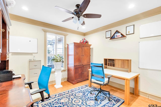 office space featuring baseboards, light wood finished floors, recessed lighting, ornamental molding, and ceiling fan