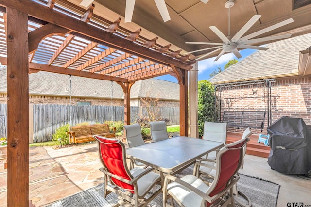 view of patio / terrace featuring a fenced backyard, outdoor dining space, a pergola, and grilling area