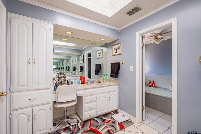 1511 Dolly Ln, Hideaway, TX 75771 - bathroom with a skylight, vanity, crown molding, tile patterned floors, and recessed lighting