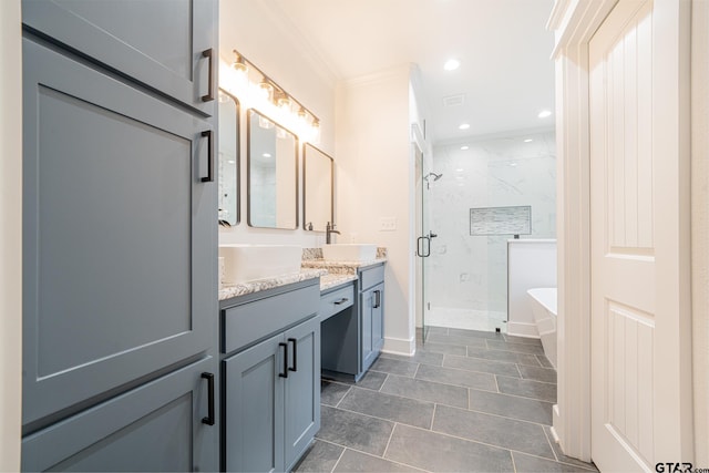 full bath with double vanity, a marble finish shower, a soaking tub, crown molding, and a sink