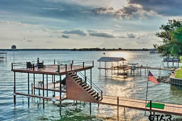 dock area with a water view