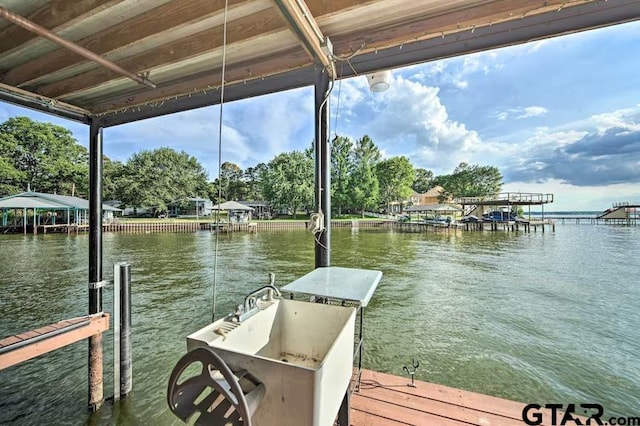 view of dock featuring a water view