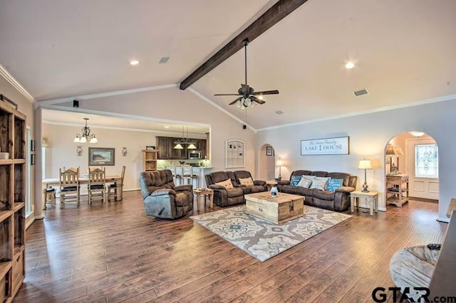 living room featuring ceiling fan with notable chandelier, dark wood-type flooring, beamed ceiling, and crown molding