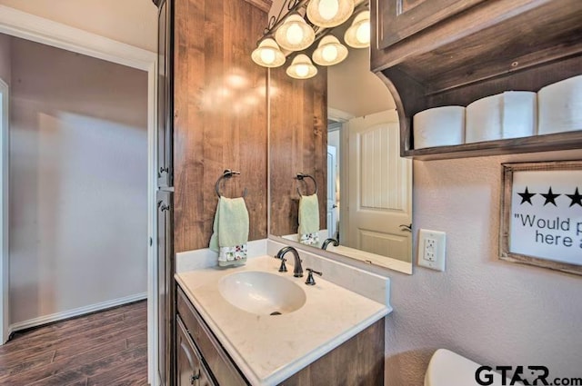 bathroom featuring vanity and hardwood / wood-style floors