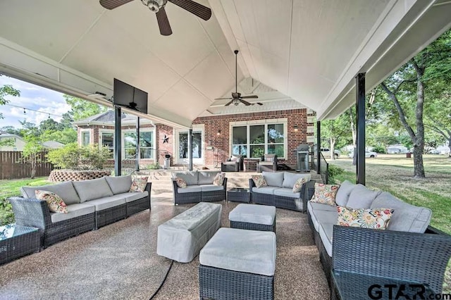 view of patio featuring ceiling fan and an outdoor living space