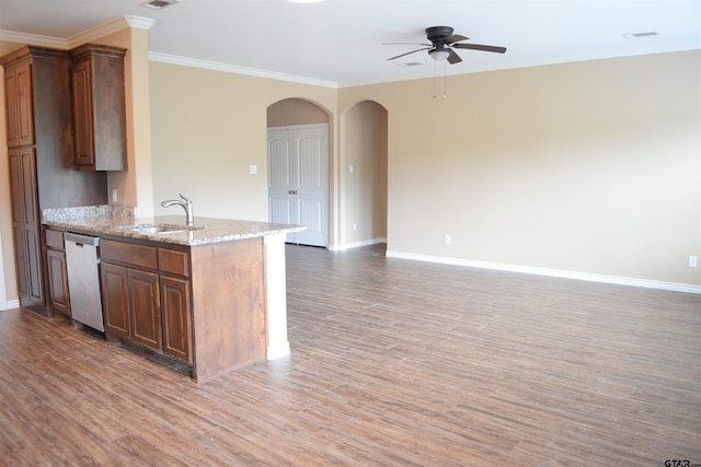 kitchen featuring ornamental molding, light wood-type flooring, sink, stainless steel dishwasher, and ceiling fan