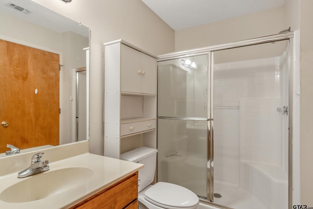 207 Pagosa Ln, Holly Lake Ranch, TX 75765 - full bathroom featuring a stall shower, toilet, and vanity