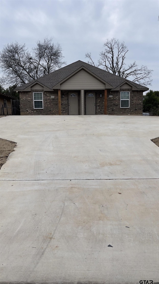 ranch-style home with brick siding