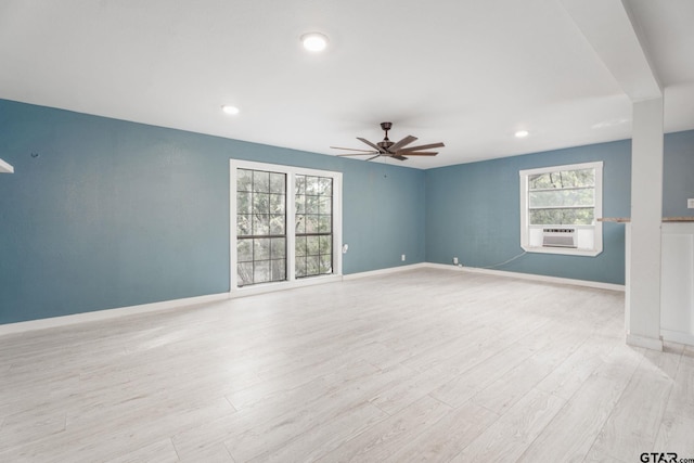 1910 E Lake St, Tyler, TX 75701 - unfurnished room featuring ceiling fan, cooling unit, light wood-style floors, and recessed lighting
