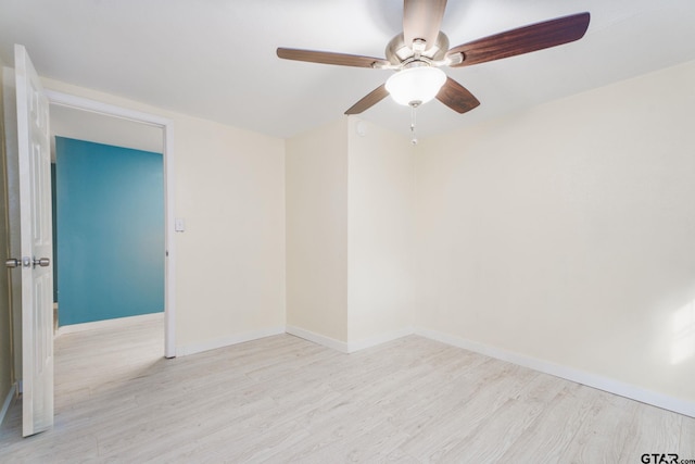 1910 E Lake St, Tyler, TX 75701 - spare room featuring wood finished floors and a ceiling fan