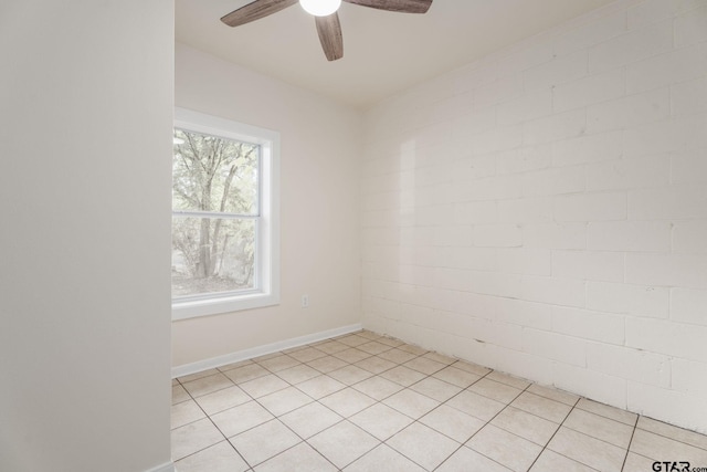 1910 E Lake St, Tyler, TX 75701 - spare room featuring ceiling fan and light tile patterned floors