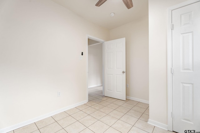 1910 E Lake St, Tyler, TX 75701 - unfurnished bedroom featuring light tile patterned flooring and ceiling fan