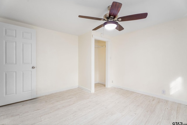 1910 E Lake St, Tyler, TX 75701 - unfurnished room featuring ceiling fan and wood finished floors