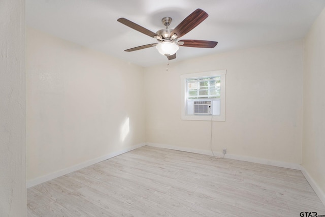 1910 E Lake St, Tyler, TX 75701 - spare room featuring cooling unit, a ceiling fan, and wood finished floors
