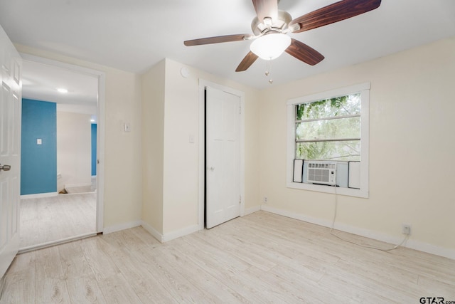 1910 E Lake St, Tyler, TX 75701 - unfurnished bedroom with cooling unit, wood finished floors, and ceiling fan