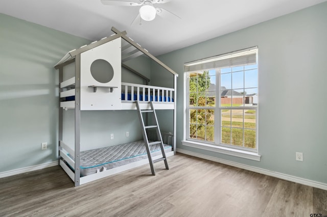 904 Van Winkle Cir, Athens, TX 75751 - unfurnished bedroom with wood finished floors and baseboards