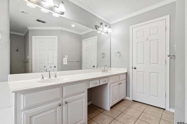 904 Van Winkle Cir, Athens, TX 75751 - bathroom with double vanity, ornamental molding, tile patterned floors, and baseboards