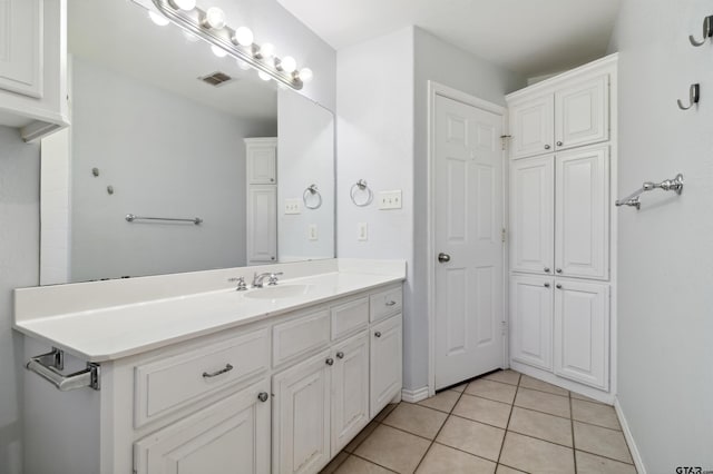 904 Van Winkle Cir, Athens, TX 75751 - bathroom featuring vanity, tile patterned floors, and baseboards