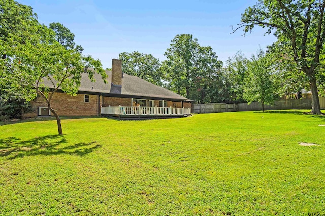 view of yard featuring a deck