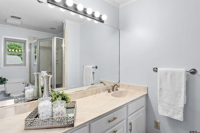 bathroom with walk in shower, vanity, and crown molding