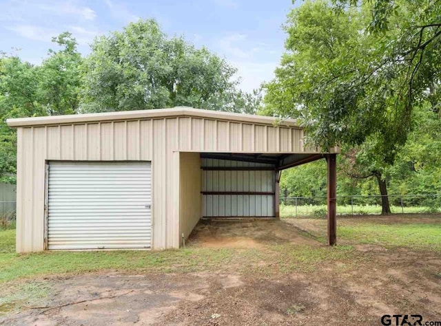 226 Circle Ridge Dr, Gilmer, TX 75645 - view of outdoor structure with an outdoor structure and fence