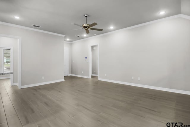 empty room with hardwood / wood-style flooring, ceiling fan, and ornamental molding