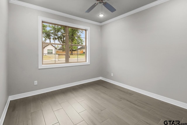 unfurnished room with hardwood / wood-style flooring, ceiling fan, and ornamental molding