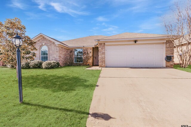 ranch-style home featuring a garage