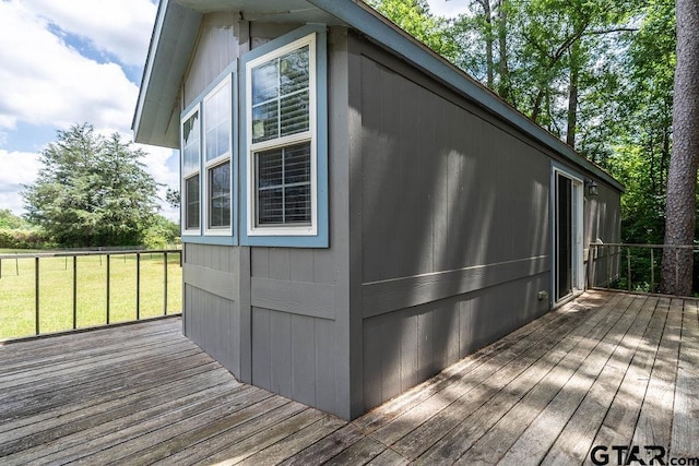 exterior space with a yard and a wooden deck